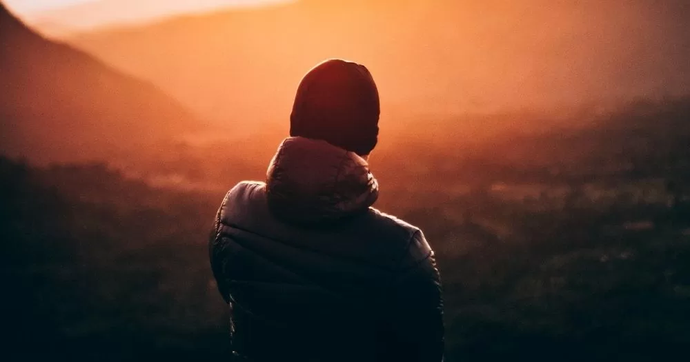This article is about sobriety. In the photo, a person staring at the horizon.