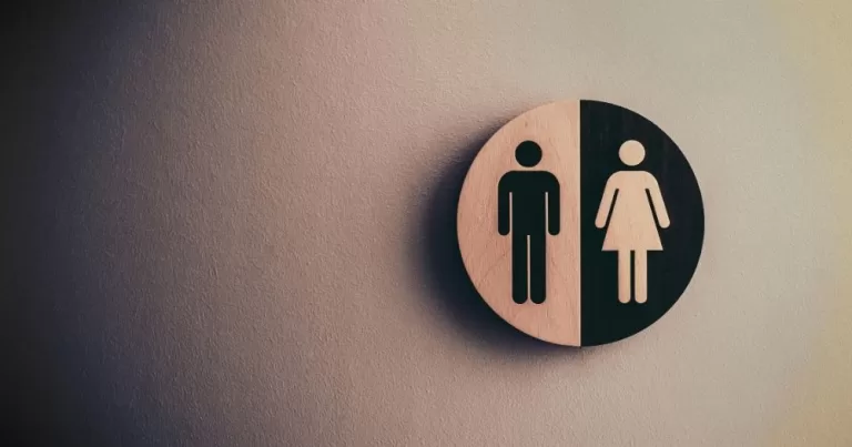 A bathroom sign with a typical male and female symbols. This image is being used to accompany a story about the ban on trans people from single-sex spaces in the UK.