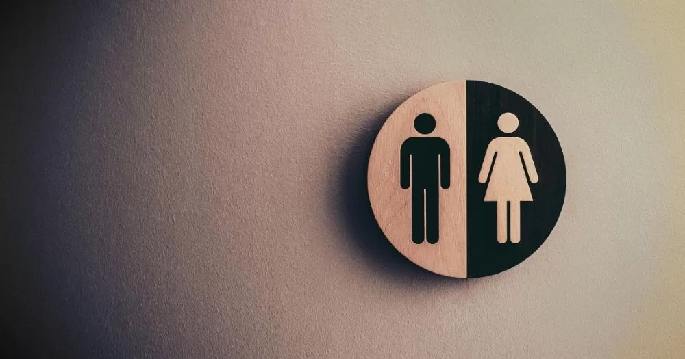 A bathroom sign with a typical male and female symbols. This image is being used to accompany a story about the ban on trans people from single-sex spaces in the UK.