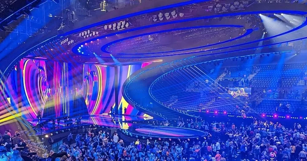 This article is about Ireland boycotting Eurovision over Israel's participation. In the photo, the Eurovision stage with a crowd of people sitting to watch the show.