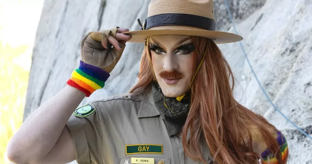 Pattie Gonia posing as she continues her hike to raise money for non-profits