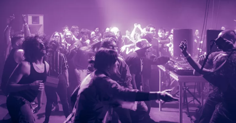 people dancing in purple light at Dublin Modular
