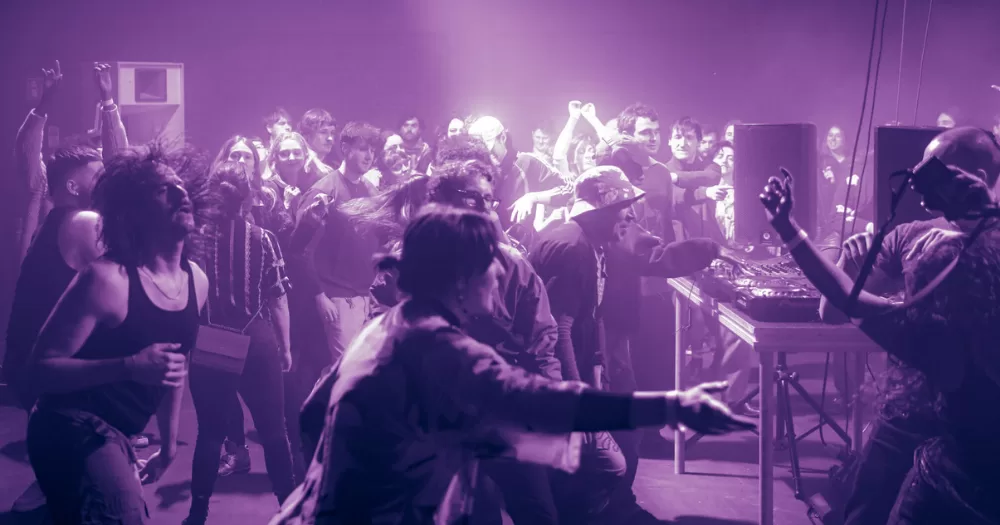 people dancing in purple light at Dublin Modular