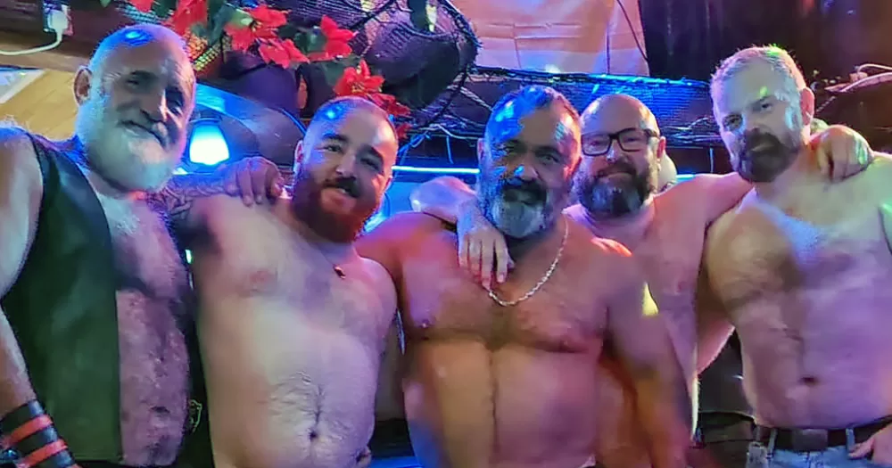 members of the bear community pose togther at event before Béar Féile 2026