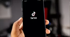A phone is held open on TikTok.
