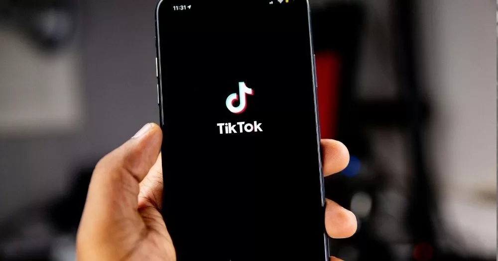 A phone is held open on TikTok.