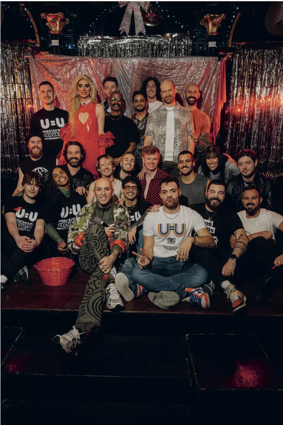 The cast and crew of OUt of Shadows pose with the Poz Vibe Team at the George.