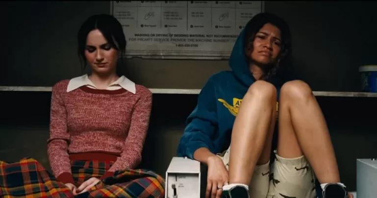 A still from Euphoria shows Maude Apatow and Zendaya sitting together.