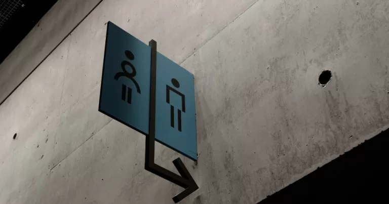 A bathroom sign indicating a single-sex bathroom facility.