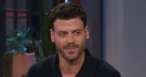 Heated Rivalry star Francois Arnaud being interviewed.