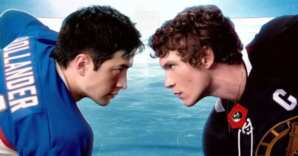 The two protagonists of TV show Heated Rivalry, which is getting a new sequel, looking at each other on the ice in their hockey uniforms.