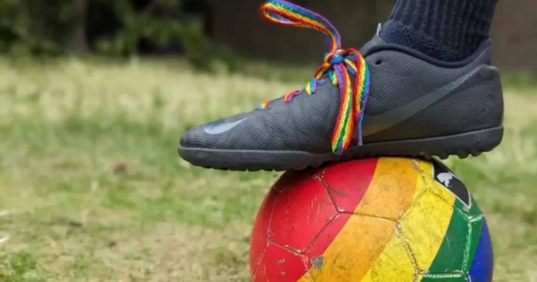 Premier League ends association with Rainbow Laces. A football boot with rainbow laces rests on a rainbow coloured football.