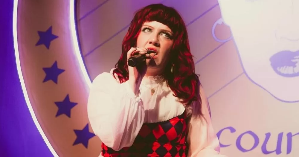 Singer CMAT, who won Album of Year, performing on a stage.