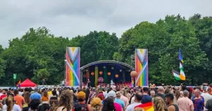 The main stage at Dublin Pride, who have just announced the 2026 festival, with people gathered in the crowd.