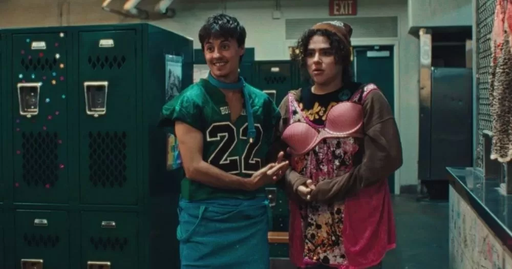 A still from the film She's the He, which is set to premiere at TITE. The image shows two young people, one is wearing a football kersey and the other wears a bra over their clothes.