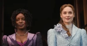 Francesca Bridgerton (right), standing next to Michaela Stirling (left) in the annoucement video for the new queer Bridgerton season 5 romance.