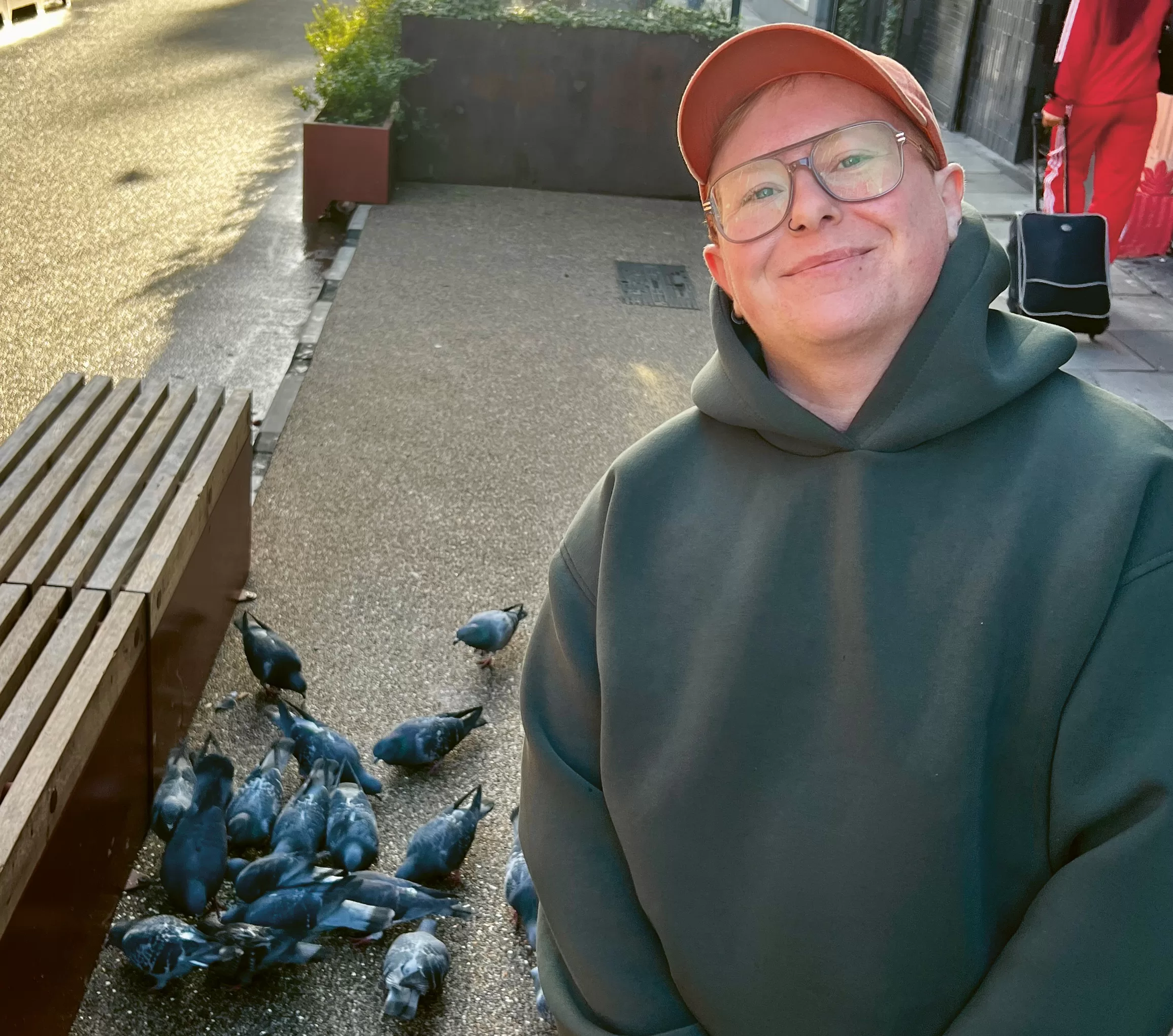 Ailo Kerr hanging out with pigeons. Ailo James Kerr hanging out with pigeons.