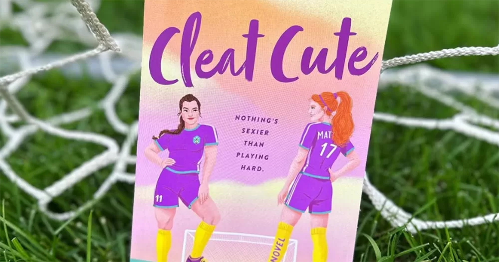 A close up of the Cleat Cute book cover, with a goal net and green grass in the background.
