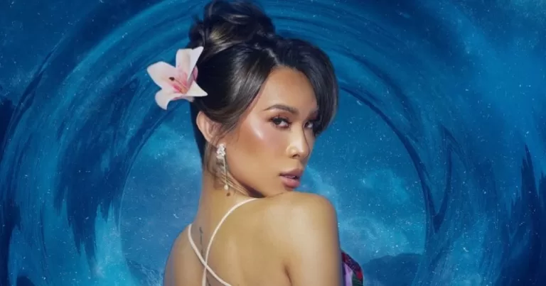 Miss Universe Philippines' 2026 host Marina Summers poses in front of a blue background.