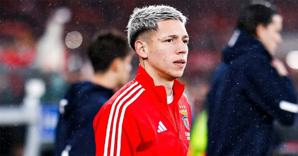 Close up of footballer Gianluca Prestianni as he walks on to a football pitch.