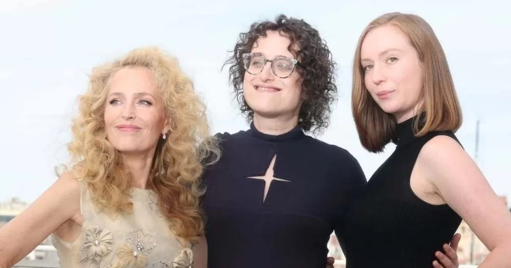 Gillian Anderson, Jane Schoenbrun, and Hannah Einbinder at the premiere of queer slasher film Teenage Sex and Death at Camp Miasma at Cannes Film Festival.