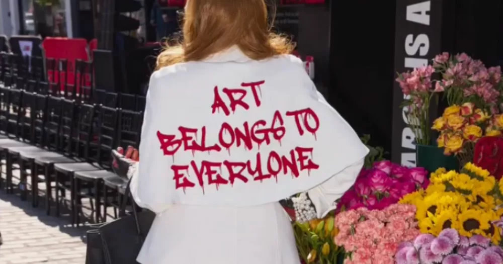 Lisa Ann Walter protesting inequality at the Met Gala.