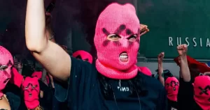 Pussy Riot member wearing pink balaclava at Venice Biennale.