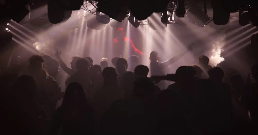 Image of people on the dancefloor at LGBTQ+ nightclub Pink Punters.