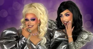Drag performers The Misses, who hosted the GCN team on their podcast, posing for a photo in full drag with a purple background.