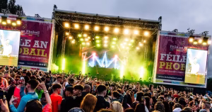 Outdoor stage and crowd at Belfast festival Féile an Phobail.