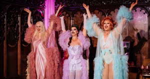 Doomslayers trio on stage for their show Apocalypse How? Left is Laylah Beattie, middle is Annie Queeries, right is Donna Fella.