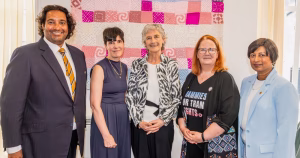 President Connolly posing for a photo with team members of LGBTQ+ organisation GOSHH.