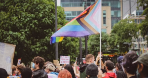 This GCNtv post is about Dublin Pride 2026. The image shows a Pride flag flying above a crowd.