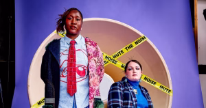 Two models wearing Orla Langan's designs. The photo is filled with different colours and interesting fashion pieces.