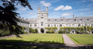 The article discusses University College Cork's TransCare conference. The image depicts the campus of UCC