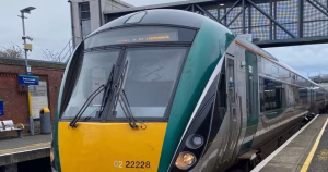 An Iarnród Éireann train stopped at a Dublin train station.