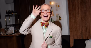 Legendary designer Bob Mackie smiling for the camera.