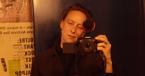 A mirror self-portrait of Céline Sciamma.
