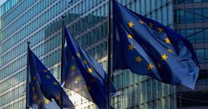This article is about the Council of Europe's new LGBTQ+ equality strategy. The image shows three European flags flying on flag poles.