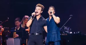 Darren Criss and Chris Colfer perform a surprise duet.